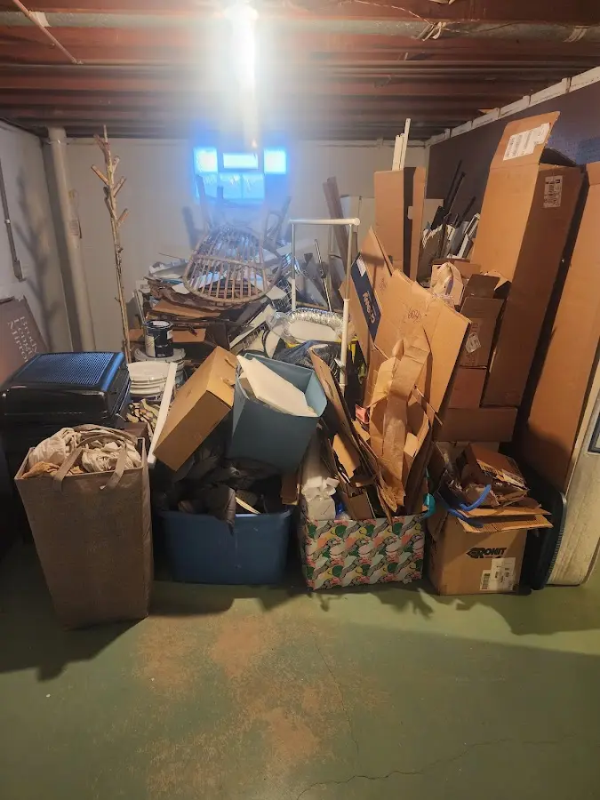 Roll-off dumpster container at job site for Concrete Dumpster Rental in Anderson